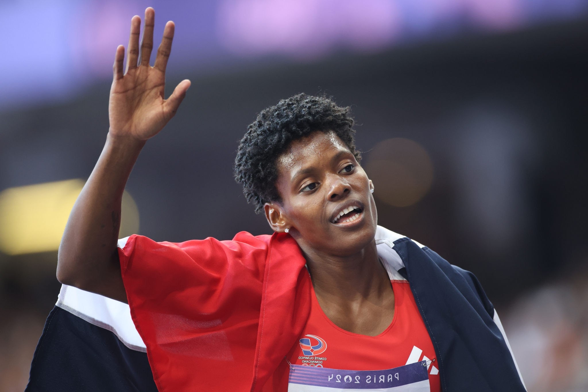 PARIS, FRANCE: AUGUST 09: Marileidy Paulino of Dominican Republic reacts to her gold medal win in the Women's 400m Final during the Athletics Competition at the Stade de France during the Paris 2024 Summer Olympic Games on August 9th, 2024, in Paris, France. (Photo by Tim Clayton/Corbis via Getty Images)